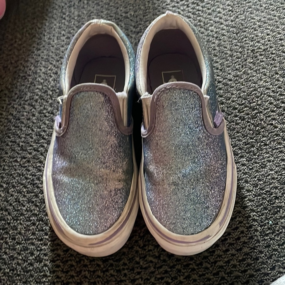 Purple and blue sparkly vans. A little worn